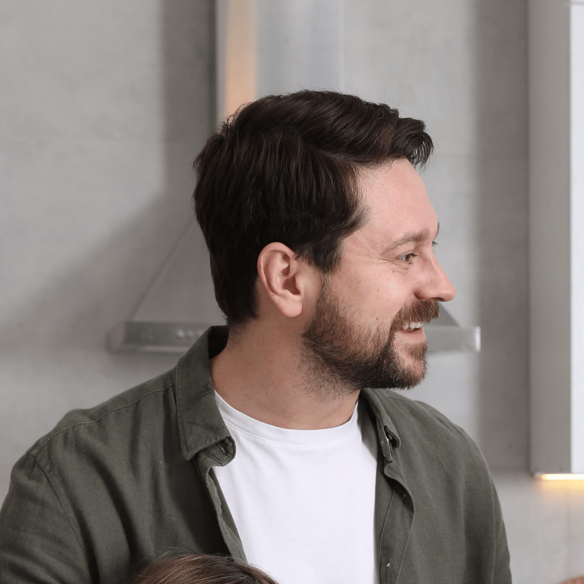 james is cooking in the kitchen.